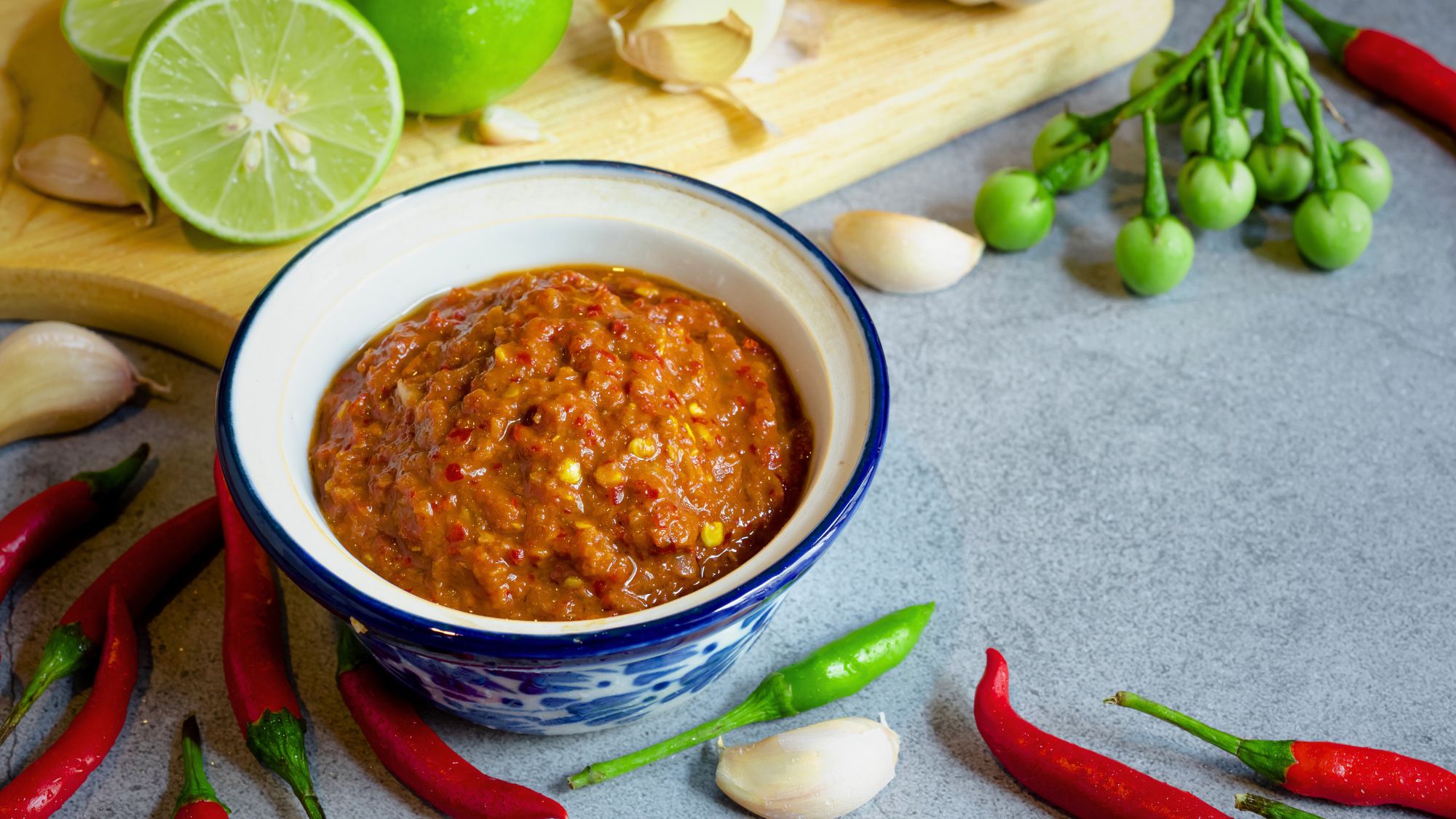 A bowl of cyrry paste, perfect for adding flavor to your gluten-free curry recipe.